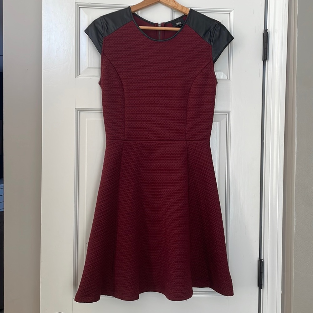 Fit and flare dress with faux leather piping  and detailing